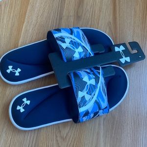 New. Under Armour Ignite slides. Men’s Size 9. Blue.